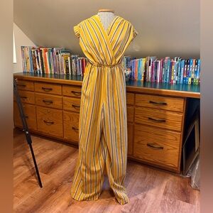 Elegant Monteau Women's Striped Jumpsuit with Open Back and Leg Slit Size S